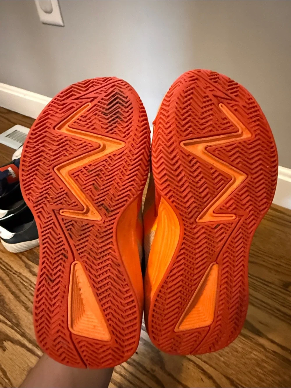 Nike Kids' Gray Sneakers with Orange and Red Lightning Accents